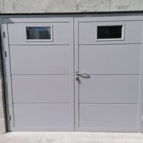 Porte battante 2 vantaux avec hublots